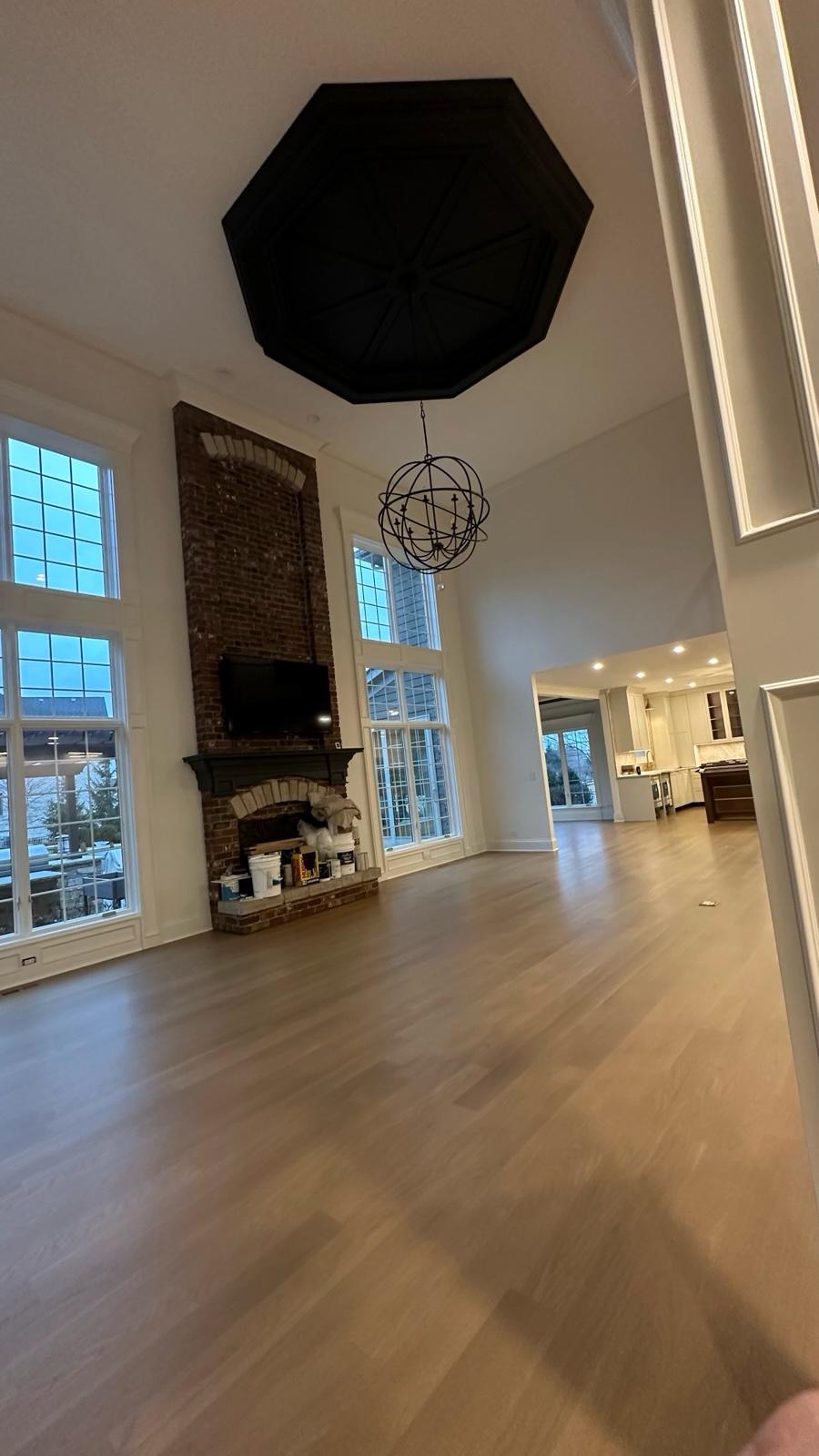 Bright two-story great room with painted walls